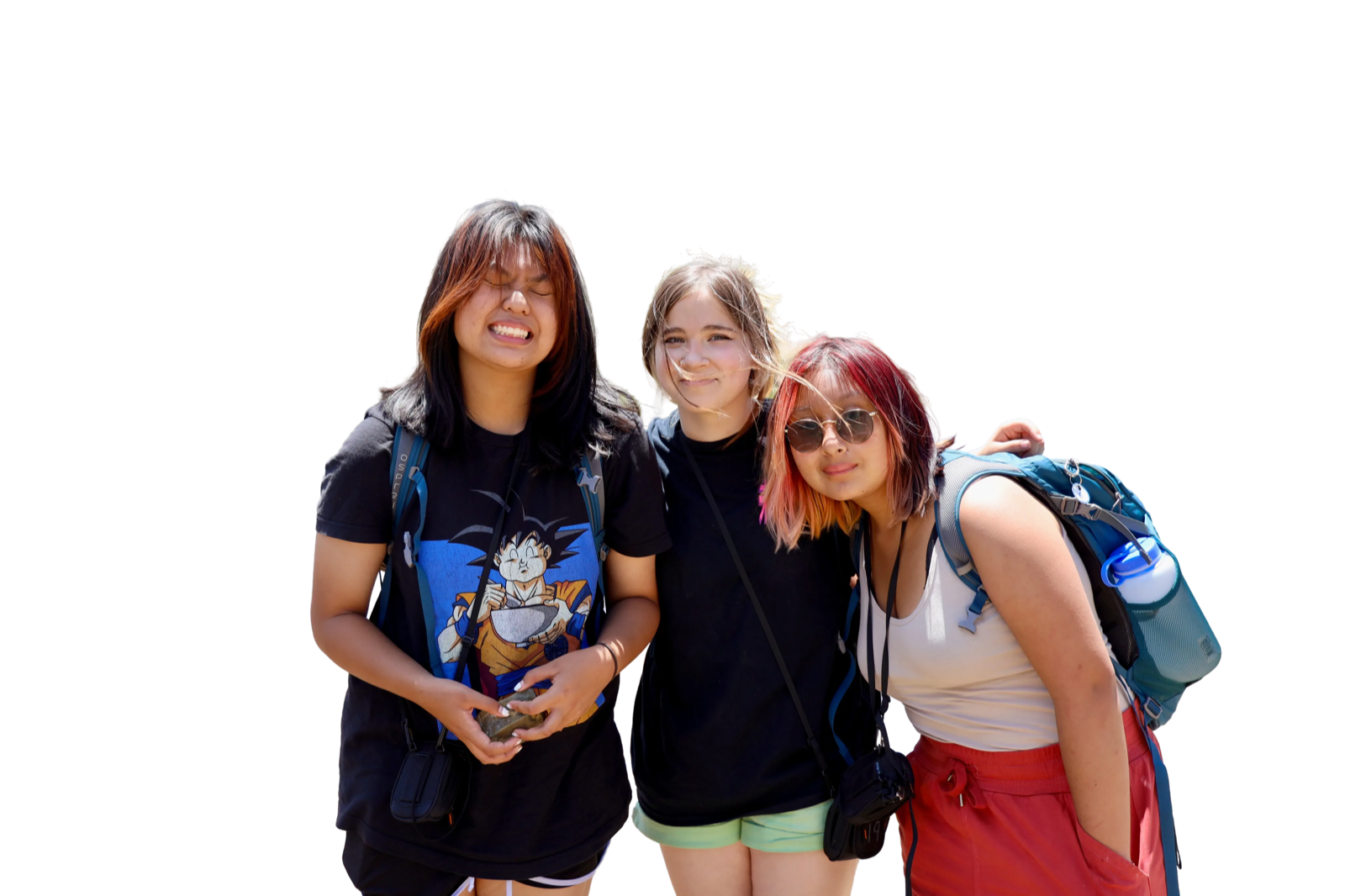 Three young people standing together during an outdoor R.O.C.K. trip